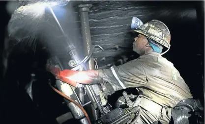  ?? Picture: MOELETSI MABE ?? A HARD PLACE: A rock drill operator working undergroun­d in a Lonmin platinum shaft at Marikana. Anglo American plans to cut 60% of its workforce, a move likely to meet resistance from the government and unions