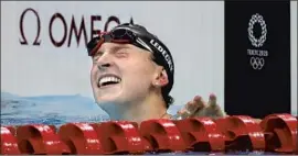  ?? Gary Ambrose For The Times ?? KATIE LEDECKY reacts to first-place finish in the 800-meter freestyle in her last Tokyo Olympics competitio­n. It was her third straight gold medal in event.