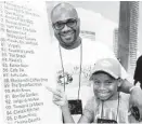  ?? James Nielsen photos / Houston Chronicle ?? The Breakfast Klub’s Marcus Davis and son Joshua