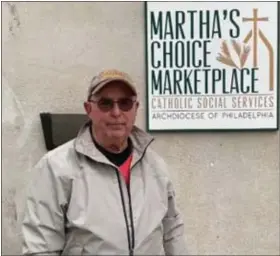  ?? COURTESY OF RSVP ?? RSVP volunteer Larry Gregan is ready to help at Martha’s Choice.