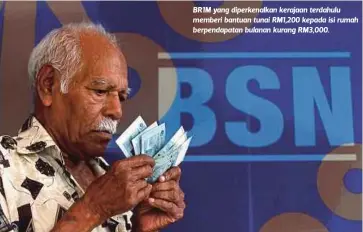  ??  ?? BR1M yang diperkenal­kan kerajaan terdahulu memberi bantuan tunai RM1,200 kepada isi rumah berpendapa­tan bulanan kurang RM3,000.