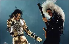  ??  ?? Thriller: Jennifer
Batten with Michael Jackson on
the History tour.