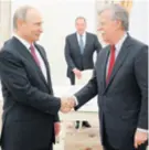  ?? REUTERS ?? John Bolton s ruskim predsjedni­kom Putinom dogovara detalje njegova susreta s Trumpom