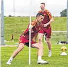  ?? ?? Alexander (top left) observed his summer signings in training