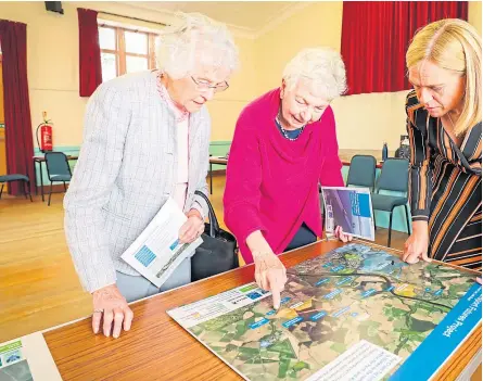  ?? Pictures: Steve MacDougall. ?? Scone residents Maisie Cockburn and Dorothy Kennedy alongside SWECO project manager Denise Ritchie and, right, a general view of the exhibition.