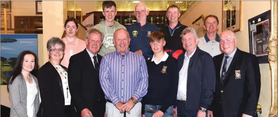  ?? Photo by Michelle Cooper Galvin ?? Michael O’Donoghue of O’Donoghue Ring Hotels (front sixth from left) presenting first prize in the Captain’s Charity Day to winners Jack Buckley President, Michael Buckley, Paul Murphy and Kieran O’Connor Junior Captain with (from left) Emma and Breda...