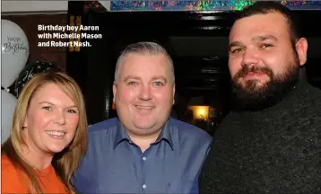  ??  ?? Birthday boy Aaron with Michelle Mason and Robert Nash.