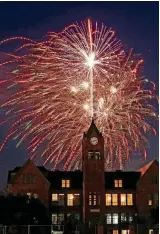  ?? [PHOTO BY DOUG HOKE, THE OKLAHOMAN ARCHIVES] ?? Fireworks form a backdrop for Old North Tower on the University of Central Oklahoma campus July 4, 2016, during the LibertyFes­t fireworks show.