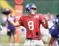  ?? Ron Schwane / Associated Press ?? New York Giants quarterbac­k Daniel Jones throws a pass against the Cleveland Browns during a joint NFL training camp practice on Thursday in Berea, Ohio.