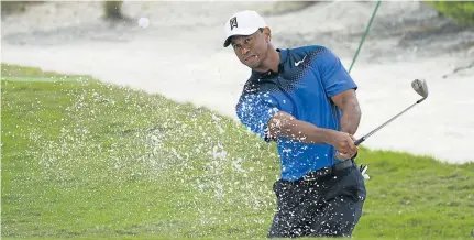  ?? Picture: USA TODAY ?? ON THE PROWL AGAIN: Tiger Woods hits out of a greenside bunker on the ninth hole during a practice round of the Hero World Challenge. Woods says he will pull out all the stops and see how far he can go