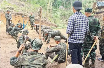  ?? — AFP photo ?? Trainees take part in military exercises with the Karen National Union (KNU) Brigade 6, an armed rebel group in eastern Karen state, amid a heightened conflict with Myanmar’s military following the February coup.