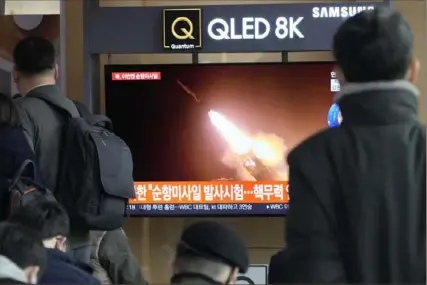  ?? Ahn Young-joon/Associated Press ?? A TV screen shows a file image of North Korea’s missile launch during a news program at the Seoul Railway Station in Seoul, South Korea. North Korea test-fired four strategic cruise missiles off its eastern coast Friday to demonstrat­e the “war posture of the DPRK nuclear combat force,” according to state media outlet Korean Central News Agency.