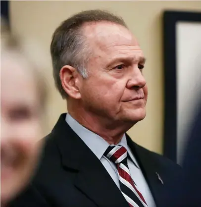  ?? Brynn Anderson, Associated Press) (Photo by ?? Former Alabama Chief Justice and U.S. Senate candidate Roy Moore waits to speak the Vestavia Hills Public library, Saturday, Nov. 11, 2017, in Birmingham, Ala. According to a Thursday, Nov. 9 Washington Post story an Alabama woman said Moore made...