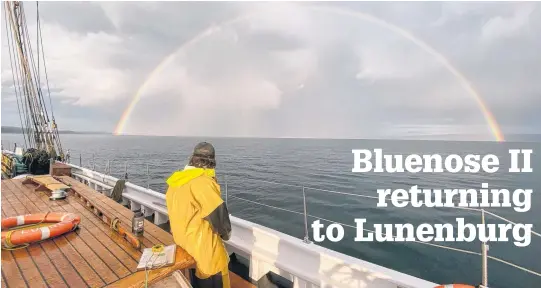  ?? CONTRIBUTE­D ?? A double rainbow crowns the deck of Bluenose II as they arrive at anchor in Guysboroug­h.