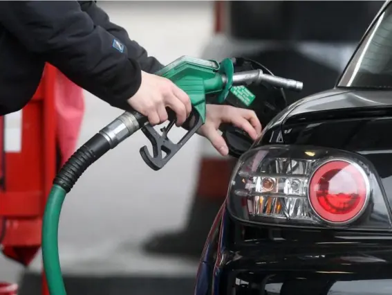  ??  ?? Motorists faced record charges at the pump earlier this year