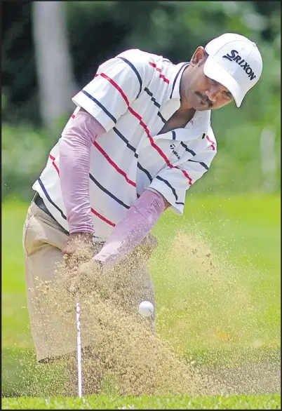  ?? Picture: ELIKI NUKUTABU ?? Golfer Nigel Goundan gets out of the sand bank at the 15th hole at the Fiji Golf Club in Suva on Sunday.