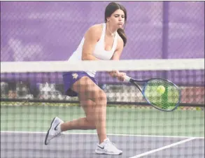  ?? Tyler Sizemore / Hearst Connecticu­t Media ?? Westhill’s Martina Kaba returns a shot during a match against Ridgefield in Stamford on Monday.