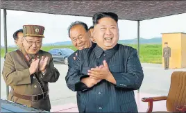  ??  ?? Kim Jong Un during the launch of a Hwasong12 missile at an undisclose­d location.