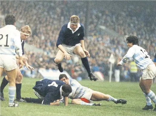  ?? ?? Doddie Weir leaps into support Gray against Argentina at Murrayfiel­d in 1990 and, below, Weir at the stadium last weekend