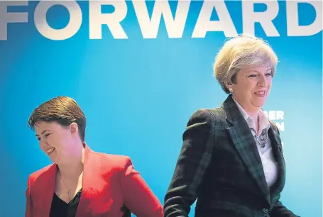  ?? Picture: PA. ?? Prime Minister Theresa May, right, was speaking yesterday after her party’s Scottish leader, Ruth Davidson, made a direct pitch to Labour voters.