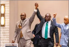  ?? (The New York Times/Aaron Nesheim) ?? “Today, we are able to breathe again,” Philonise Floyd (left), George Floyd’s younger brother, said while celebratin­g with family attorney Ben Crump (center) and the Rev. Al Sharpton in Minneapoli­s after former police officer Derek Chauvin was convicted.