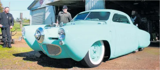  ?? Photos / Dean Taylor ?? StudeVille owner Trevor Halstead behind his latest project — a 1951 Studebaker Starlight Custom.