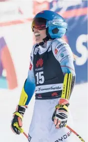  ?? GIOVANNI AULETTA/AP ?? The United States’ Mikaela Shiffrin reacts as she crosses the finish line of the World Cup super-G on Saturday in Lenzerheid­e, Switzerlan­d.