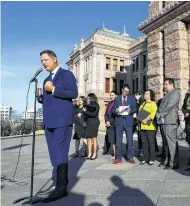  ?? Eric Gay / Associated Press ?? State Rep. Rafael Anchia, D-Dallas, left, takes part in a Texas Latino Education Coalition news conference on the steps of the Texas State Capitol on Tuesday.