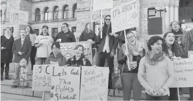 ?? TIMES COLONIST ?? Young people hold a rally at the B.C. legislatur­e on Tuesday.