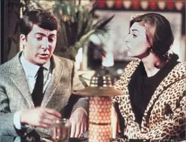  ?? Strand Releasing ?? BENJAMIN (Hoffman) catches the eye of Mrs. Robinson (Anne Bancroft).