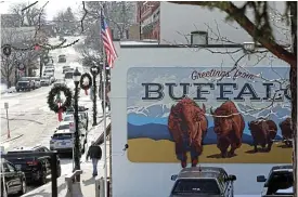 ?? /Reuters ?? Modern outlaws: A mural in Buffalo, Wyoming, US. Wyoming is not alone in allowing anonymous shell firms, but hackers favour Wyoming LLCs because they are advertised as being cost-effective.