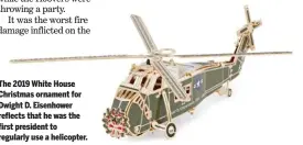  ??  ?? The 2019 White House Christmas ornament for Dwight D. Eisenhower reflects that he was the first president to regularly use a helicopter.