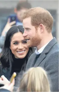  ?? Pictures: Getty. ?? Florist Philippa Craddock in her London studio, and Prince Harry and Meghan Markle.