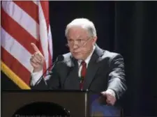  ?? ANDY BARRON — THE RENO GAZETTE-JOURNAL VIA AP ?? U.S. Attorney General Jefferson Sessions talks about immigratio­n at the NASRO School Safety Conference at the Peppermill Resort on Monday in Reno, Nev.