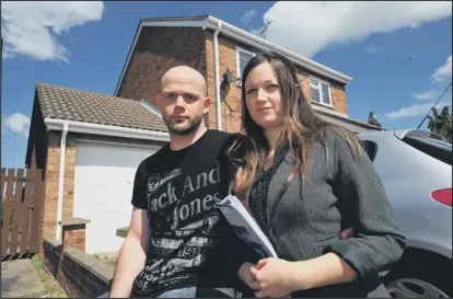  ??  ?? upset: Laura Nichols and Guy Charnley who are living with Laura’s parents in Farcet.