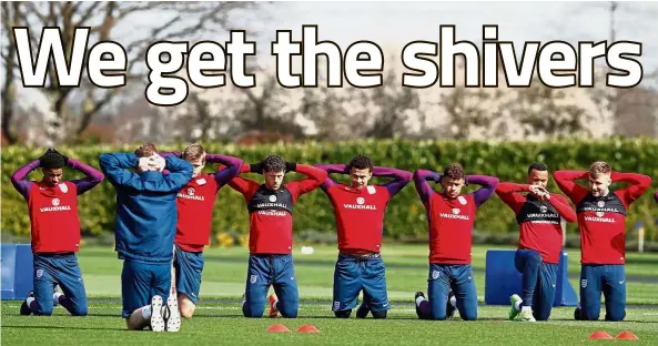  ??  ?? Freeze, remember Iceland?: (from left) England’s Marcus Rashford, Eric Dier, Ross Barkley, Dele Alli, Alex Oxlade- Chamberlai­n, Ryan Bertrand and Luke Shaw stretching during a training session in London yesterday ahead of the 2018 World Cup qualifier...