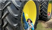  ?? IAING MCGREGOR/STUFF ?? Big, heavy tractors will have to be replaced by lighter vehicles that cause less soil damage and are better for the environmen­t.