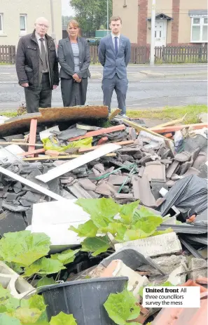  ??  ?? United front All three councillor­s survey the mess