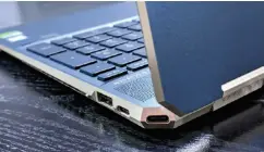 ??  ?? The most distinctiv­e visual element of the HP Spectre X360 15 is the way in which its rear corners have been flattened to accommodat­e a Usb-c/thunderbol­t port on the right rear corner...