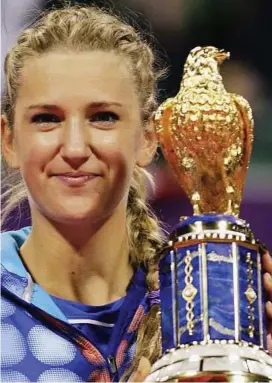  ??  ?? Another one: Victoria Azarenka with her Qatar Open trophy on Sunday. — Reuters