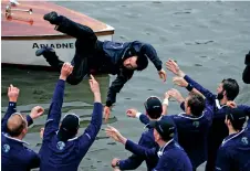  ?? LEFTERIS PITARAKIS ASSOCIATED PRESS FILE PHOTO ?? Members of the Oxford University rowing team throw their cox, Nicholas Brodie, into the river in 2008 after beating Cambridge University at the 154th annual Boat Race.