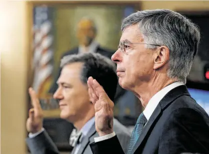  ?? Alex Brandon / Associated Press ?? Top U.S. diplomat in Ukraine William Taylor, right, and career Foreign Service officer George Kent are sworn in.