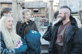  ?? — CP ?? Toronto Blue Jays third baseman Josh Donaldson, right, is shown on the set of the TV show Vikings. Donaldson plays the part of Hoskuld, ‘a Viking warrior of great skill,’ in Wednesday’s episode.