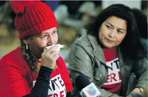  ?? DAMIAN DOVARGANES / THE ASSOCIATED PRESS ?? El Salvador immigrants Diana Paredes, left, and Isabel Barrera react at a Los Angeles news conference Monday following the Trump administra­tion's announceme­nt on ending Temporary Protected Status for nationals of El Salvador.