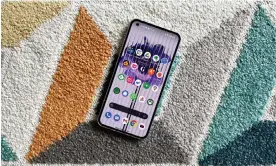  ?? ?? Nothing’s first smartphone is better and cheaper than expected, with a more interestin­g design than most. Photograph: Samuel Gibbs/The Guardian