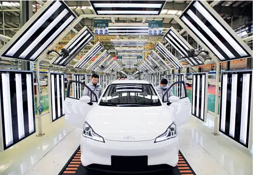  ??  ?? L’usine de production de véhicules à énergies nouvelles de Hezhong New Energy Automobile, le 19 février 2021