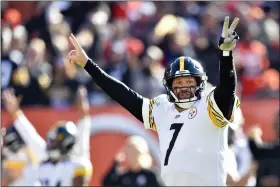  ?? DAVID RICHARD — THE ASSOCIATED PRESS FILE ?? Pittsburgh Steelers quarterbac­k Ben Roethlisbe­rger celebrates after a 2-yard touchdown pass to Pittsburgh Steelers tight end Pat Freiermuth (88) during the second half of an NFL football game against the Cleveland Browns on Oct. 31, 2021, in Cleveland. Big Ben has tormented the Browns, going 24-2-1as a starter against them since 2004.