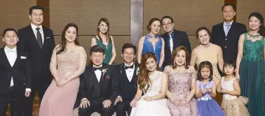  ??  ?? (Seated) Michelle Gankee, Dr. Henry Lim Bon Liong, Brian and Sharlyn Lim, Rita Lim with Honor, Cherie and Lauren Lin; (standing) Joshua and Osmond Gankee, Pauline Lim, Hazel and Francis Lee Hok, Lin Yi Chang and Alyssa Gankee