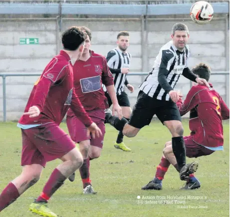  ?? Robert Parry-Jones ?? Action from Holyhead Hotspur’s 3-0 defeat to Flint Town