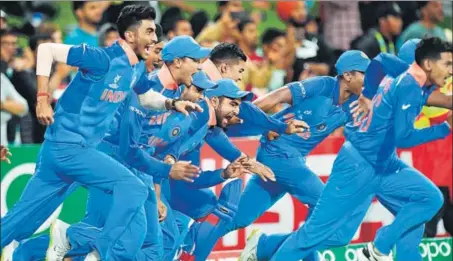  ?? AFP ?? India Under19 players burst out of the dugout to celebrate their ICC Under19 World Cup victory over Australia at the Bay Oval in Mount Maunganui, New Zealand on Saturday. India became the first team to win four titles.
